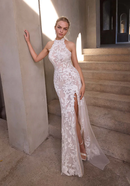 Halter neck fitted wedding dress with high leg split 